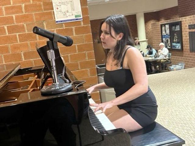 Maddy Colello performs an original song.